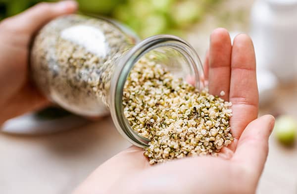 Pouring Hemp Seeds